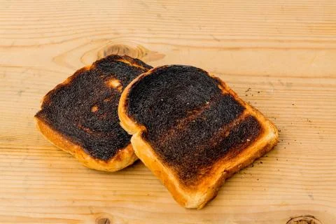 Burnt toast bread slices Stock Photos