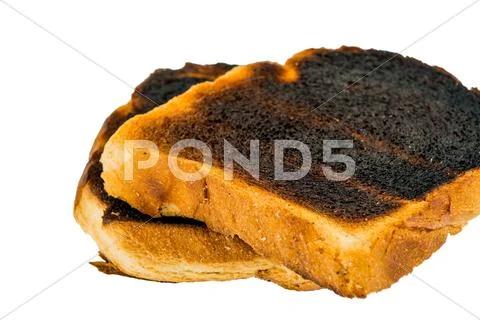 Burnt toast bread slices Stock Photos