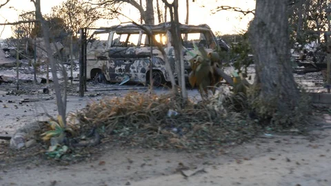 Burnt VW van shot from a moving vehicles after the Woolsey Fire - 2018 Stock Footage