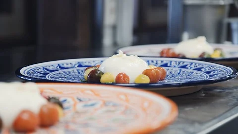 Burrata cheese with cherry tomatoes Stock Footage 114211313