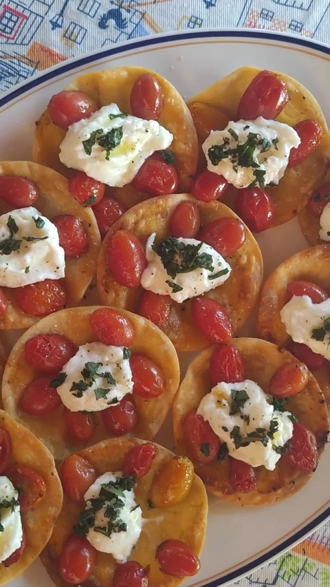 Burrata, cherry tomato and basil bruschetta. Stock Footage 303308212