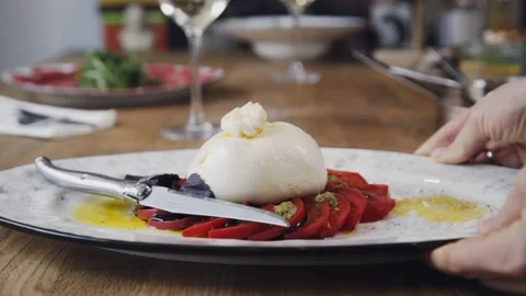 Burrata dish served by the restaurant. Stock Footage 131388971