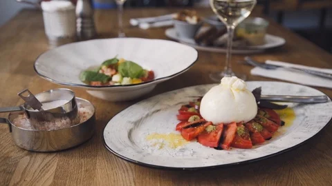 Burrata with tomato and basil. Stock Footage 112389341