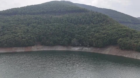 Bursa Dam Lake Surrounded by Lush Green Forests. Video stock 312494807