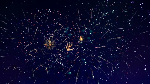Bursting fireworks in the sky Stock Footage 95533797