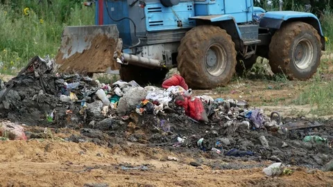Burying of rubbish at dump Stock Footage 78450698
