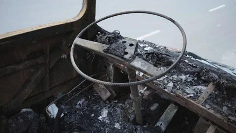 Bus after the fire. Explosion of a bomb in a passenger vehicle Stock Footage 113962795