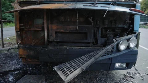 Bus after the fire. Explosion of a bomb in a passenger vehicle Stock Footage 115720761