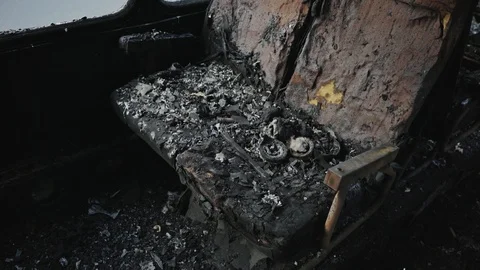 Bus after the fire. Explosion of a bomb in a passenger vehicle Stock Footage 115720802