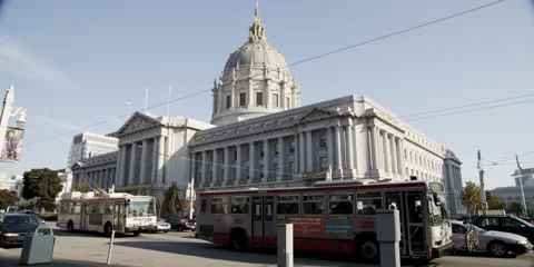 Bus and streetcars in front of San Francisco City Hall Stock Footage