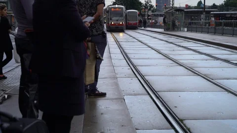 Bus arriving at bus stop to pick up travellers Stock-Footage 122175939