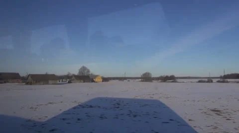 Bus car shadow in motion on snowy field 库存影片 47494544
