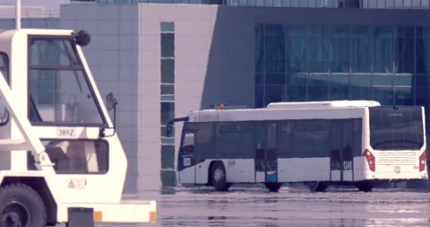 This bus carries passengers after the plane lands and delivers on board  Stock Footage 119571405