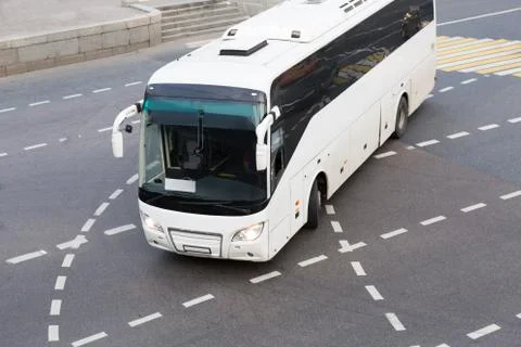 Bus at the city intersection Stock Photos