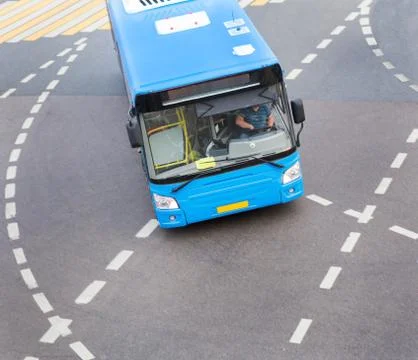 Bus at city intersection Stock Photos