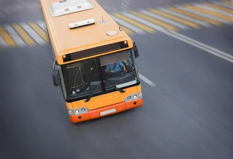 Bus at city intersection Stock Photos