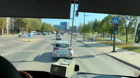 Bus, coach dashboard view driving avenue on riverbank in Kaunas city. Vídeo Stock 279321875