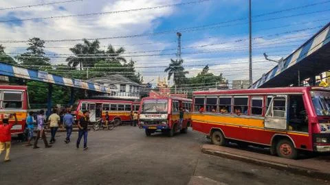 Bus commuters wait for the bus at a bus stop in the Asansol city Stock Photos