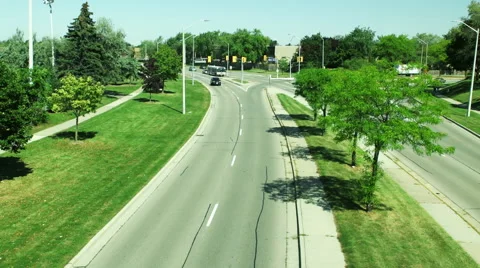 Bus in distant intersection making turn Stock Footage 55493002