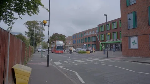 Bus by doctors surgery Stock Footage 116553782