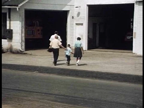 A bus driver demonstrates how to check all aspects of a school bus to make sure Video stock 75189682