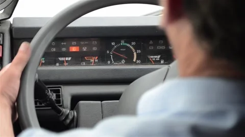 Bus driver drive the car holding the steering wheel which he skillfully handl Stock Footage 59588363