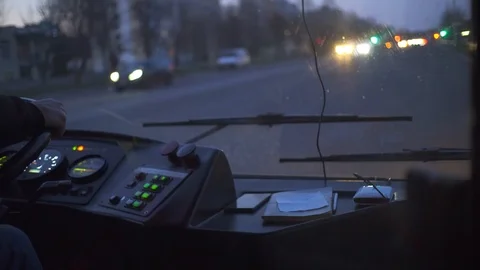 The bus driver is driving along the road. view from the cab of the bus, on the b Stock Footage 106419808