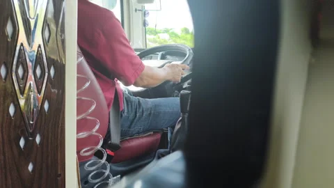 The bus driver grips the steering wheel. Stock Footage 319825937