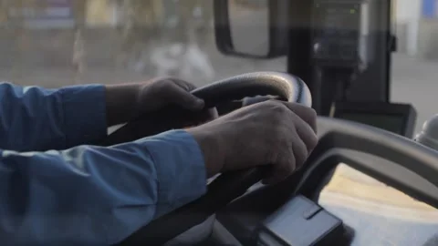 Bus Driver's Hand on Steering Wheel. High quality 4k footage Stock-Footage 253705436