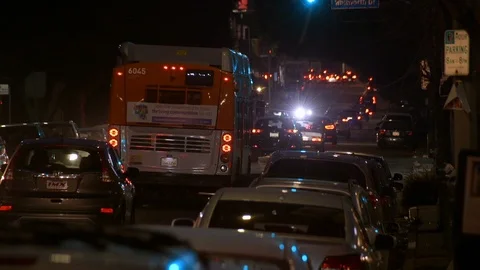Bus Drives Down Fairfax - Los Angeles, CA Stock Footage 95907601