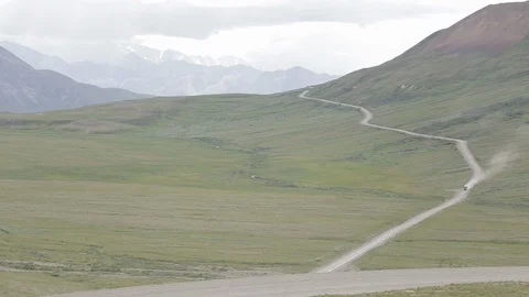 Bus Driving Down Hillside Dirt Road Denali National Park Stock Footage 121478312