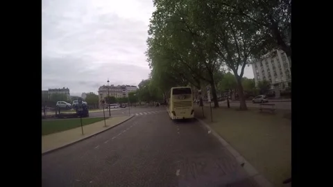 Bus driving through the city streets of Paris France Stock Footage 330239377