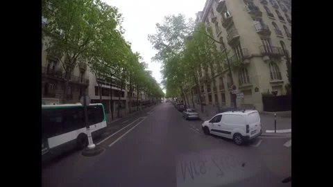 Bus driving through the city streets of Paris France Stock Footage 330239652