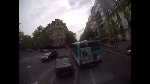 Bus driving through the city streets of Paris France Stock Footage 330239862