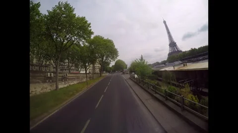Bus driving through the city streets of Paris France Stock Footage 330240283