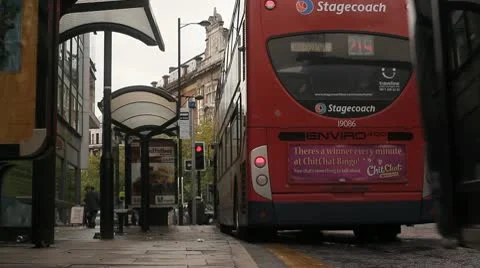Bus drops off passengers Stock Footage 10689279