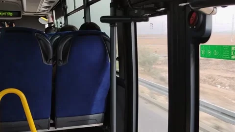 The bus is empty. The seats are blue. Transportation in road. Stock Footage 325123539