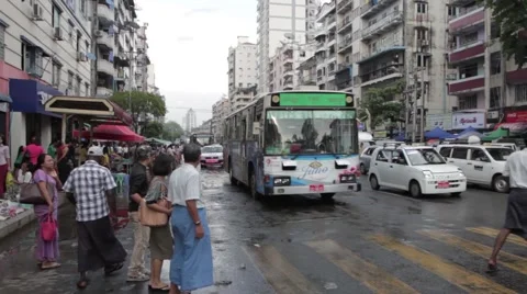 Bus full of people stops at intersection, Yangon, Myanmar Stock Footage 56632069