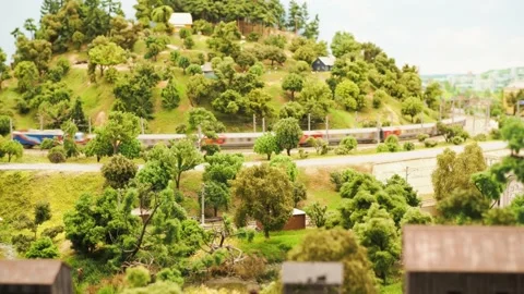 The bus goes along the route - a model of the city and the railway Stock Footage 197682866