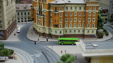 The bus goes along the route - a model of the city and the railway Stock-Footage 197682964