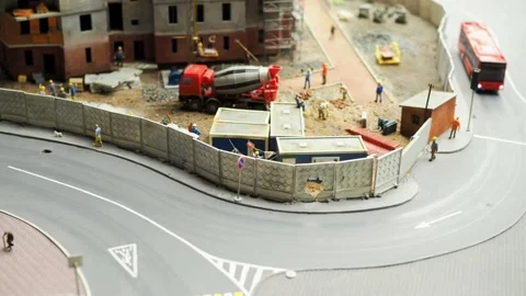 The bus goes along the route - a model of the city and the railway Stock-Footage 197683120