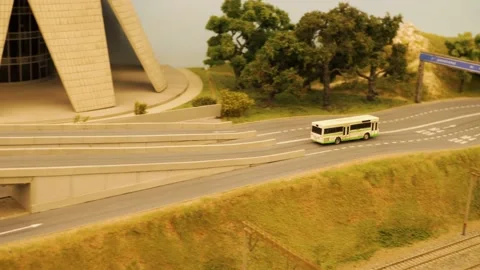 The bus goes along the route - a model of the city and the railway Stock-Footage 197683210