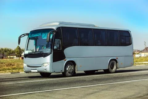 Bus goes on highway Stock Photos