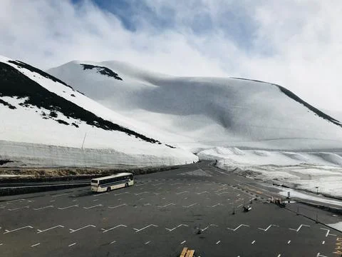 A bus going to ice mountain Stock Photos