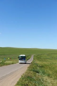 Bus in grassland Stock Photos