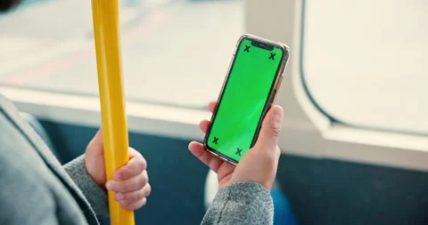 Bus, green screen and hands of man with phone in city for journey, commute or Stock Footage 303591410