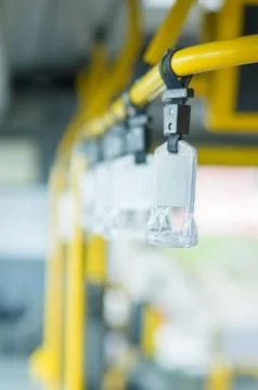 Bus handles for standing passengers Stock Photos