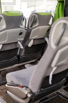 Bus interior featuring comfortable, modern seats with a sleek design. The arr Stock Photos