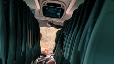 Bus, interior. Passenger paying the ticket inside the vehicle Stock Footage 91293101