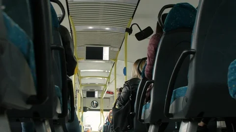 Bus, interior. Passenger validates the ticket in the machine Stock Footage 90768296